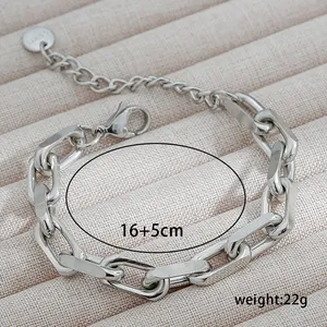 Polished stainless steel Cuban chain bracelet with adjustable clasp and logo tag