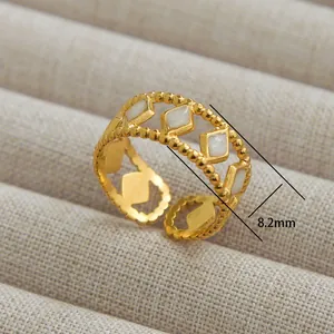 8.2mm wide hollow golden stainless steel ring with beaded edges and white diamond inlay
