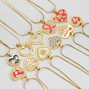 Multiple gold heart pendant necklaces with enamel dripping and crystal accents
