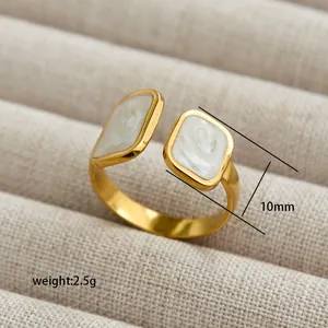Minimalist gold open ring with asymmetrical rectangular white textured stone inserts