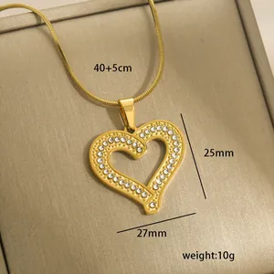 Close-up of 14k gold plated heart pendant necklace with shimmering micro-pave crystals