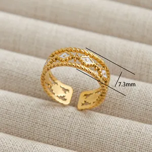 Macro detail of a 7.3mm gold-plated stainless steel ring with a rope texture