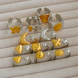 Detailed collection of assorted floral and geometric open rings in gold and silver finish