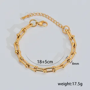 Dettaglio del bracciale a maglie dorate con dimensioni 18+5cm e larghezza 8mm