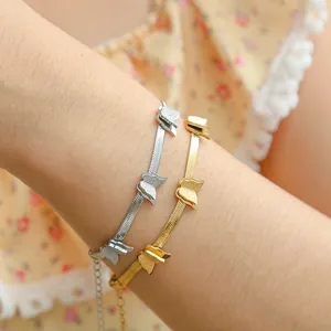 Titanium steel snake chain bracelet with five matte butterfly charms in gold and silver