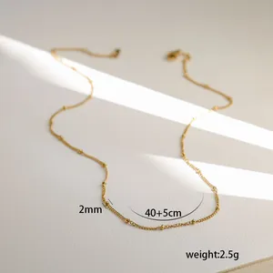 Detail of 45cm gold snake bone chain with 2mm beads showing precise 40+5cm length
