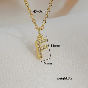 Detail showing gold 26 letter F square pendant necklace with zircon 45+5cm size info