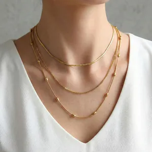 Three-layer gold-plated stainless steel stackable necklace with beads and snake chain