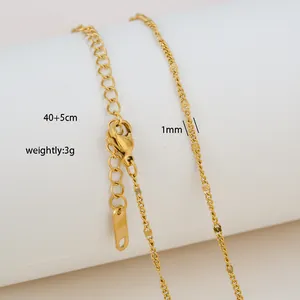 Detail of 18K gold plated stainless steel chain showing lobster clasp and 40+5cm extension