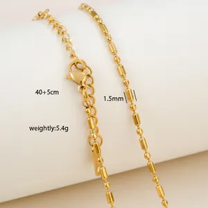 Detail of 18K gold plated stainless steel bead chain with lobster clasp and extension