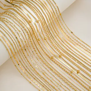Selection of minimalist 18K gold plated stainless steel chains in various styles and textures