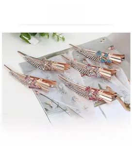 Detailed view of high-quality rhinestone bow hair clips in five elegant assorted colors