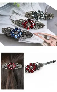 Detail of vintage flower hair clip with sparkling rhinestones and metal spring closure