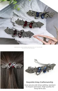Close-up of sparkling rhinestones and spring clip mechanism on the butterfly hairpin