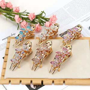 Set of 6 colorful butterfly hair clips with rhinestones in various elegant finishes