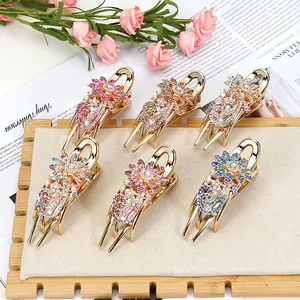 Elegant floral rhinestone hair clips set with six colorful crystal hairpins on a display