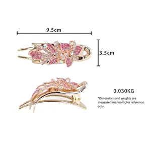 Golden hair clip with pink and white rhinestones in flower design, size 9.5x3.5cm