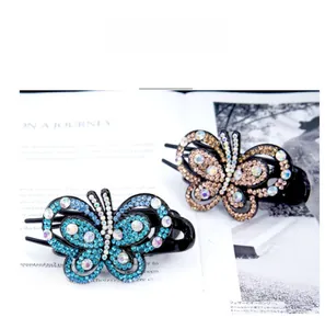 Détails des barrettes papillon ornées de cristaux brillants bleus et couleur champagne