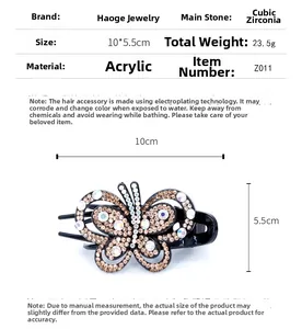 Détail de la pince à cheveux papillon élégante 10x5,5 cm ornée de strass étincelants