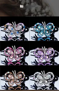Aperçu de six pinces à cheveux papillon colorées avec cristaux sur surface réfléchissante