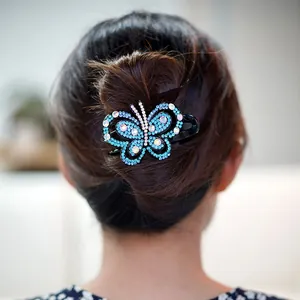 Pince à cheveux papillon élégante avec cristaux bleus pour coiffures relevées