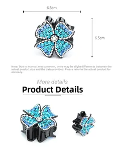 Detail of 6.5cm four-leaf flower hair claw clip with blue rhinestones and measurements