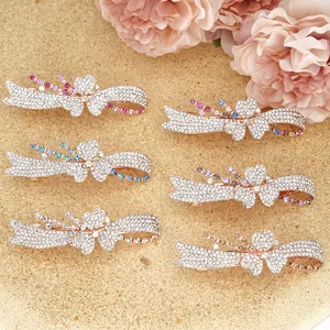 Elegant 6-piece rhinestone hair clip set with floral and bow designs on rose gold metal