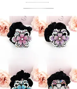 Peony hair scrunchie with rhinestones on velvet fabric showing 6.7cm diameter detail