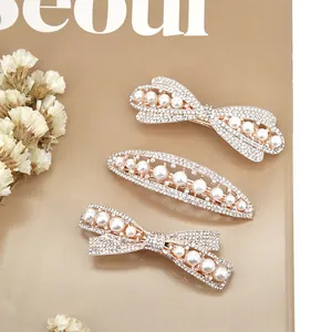 Elegant 3-piece rose gold hair clip set with white pearls and rhinestones bow designs