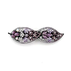 Elegant purple rhinestone bow hair clip with leaf design and sparkling silver crystals