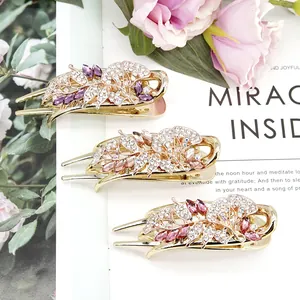Floral crystal hair clips set with rhinestones and vintage flower design for women