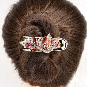 Elegant floral hair claw clip with red rhinestones on gold alloy for women's updos