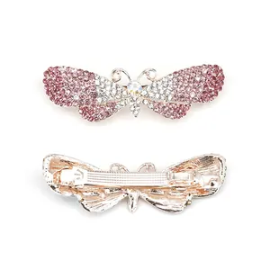 Elegante pinza de mariposa con diamantes de imitación rosas y mecanismo dorado