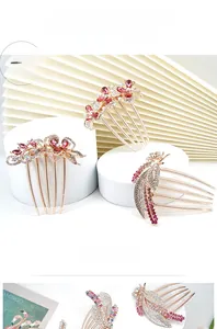 Detailed view of alloy crystal hair combs with rose gold plating and floral accents