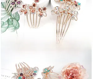 Close-up of golden alloy hair combs with crystals and colorful gemstones for wedding