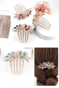 Detail of vintage flower hair comb with colorful crystals and long tassels for weddings