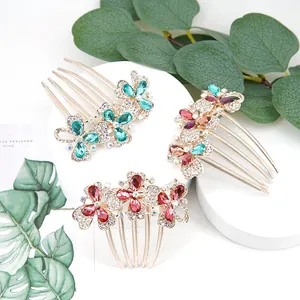 Three-piece set of butterfly hair combs with colorful rhinestones and gold plating