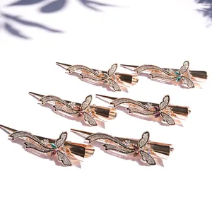 Ensemble de pinces à cheveux papillon en or rose avec strass et gemmes colorées