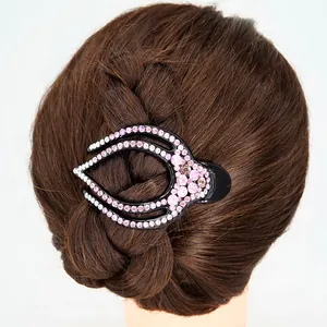 Pince à cheveux ethnique en acrylique noir avec strass roses pour coiffures élégantes
