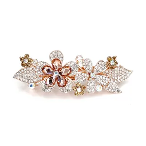 Elegant gold-plated flower spring clip hairpin with white and champagne crystals