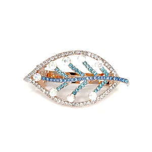 Elegant leaf-shaped spring hair clip with blue crystals and rose gold alloy base