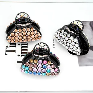 Set de pinces à cheveux requin en noir avec cristaux dorés, blancs et multicolores brillants