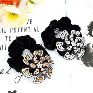 Elegant velvet floral hair scrunchies with sparkling rhinestones in black and champagne