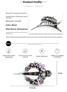 Close-up of a 9.5cm purple heart hair claw clip with black rhinestones and acrylic base