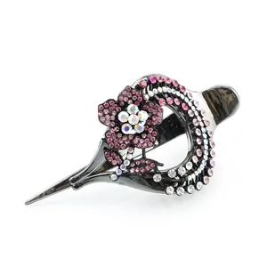 Floral heart hair clip with pink rhinestones on gunmetal finish for elegant hairstyling