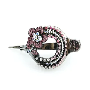 Pink crystal flower hair claw clip with gunmetal finish and sparkling rhinestones