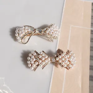 Barrettes à cheveux nœud doré avec perles blanches et cristaux pour coiffures de mariée