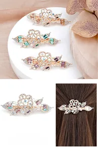 Close-up of elegant flower hair clips with colorful crystals and rhinestones in various colors