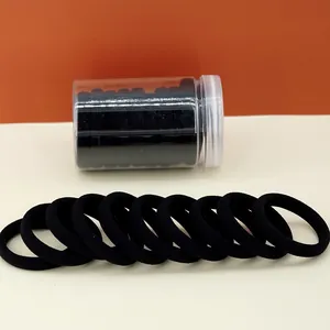 Classic black seamless high-elasticity hair ties set in a transparent storage jar