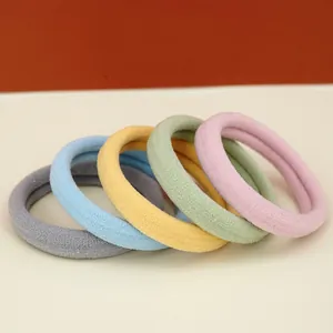 Five seamless high-elastic cotton hair ties in pastel colors for women daily hair styling